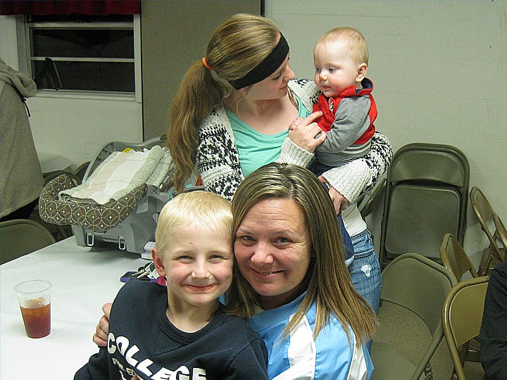 Nikki McVay — with Owen Kerwin, 6 — and her daughter, Micah McVay — with Owen’s brother, Grant, 7 months — attended the Laurel Hill Harvest Supper on Wednesday at First Baptist Church.