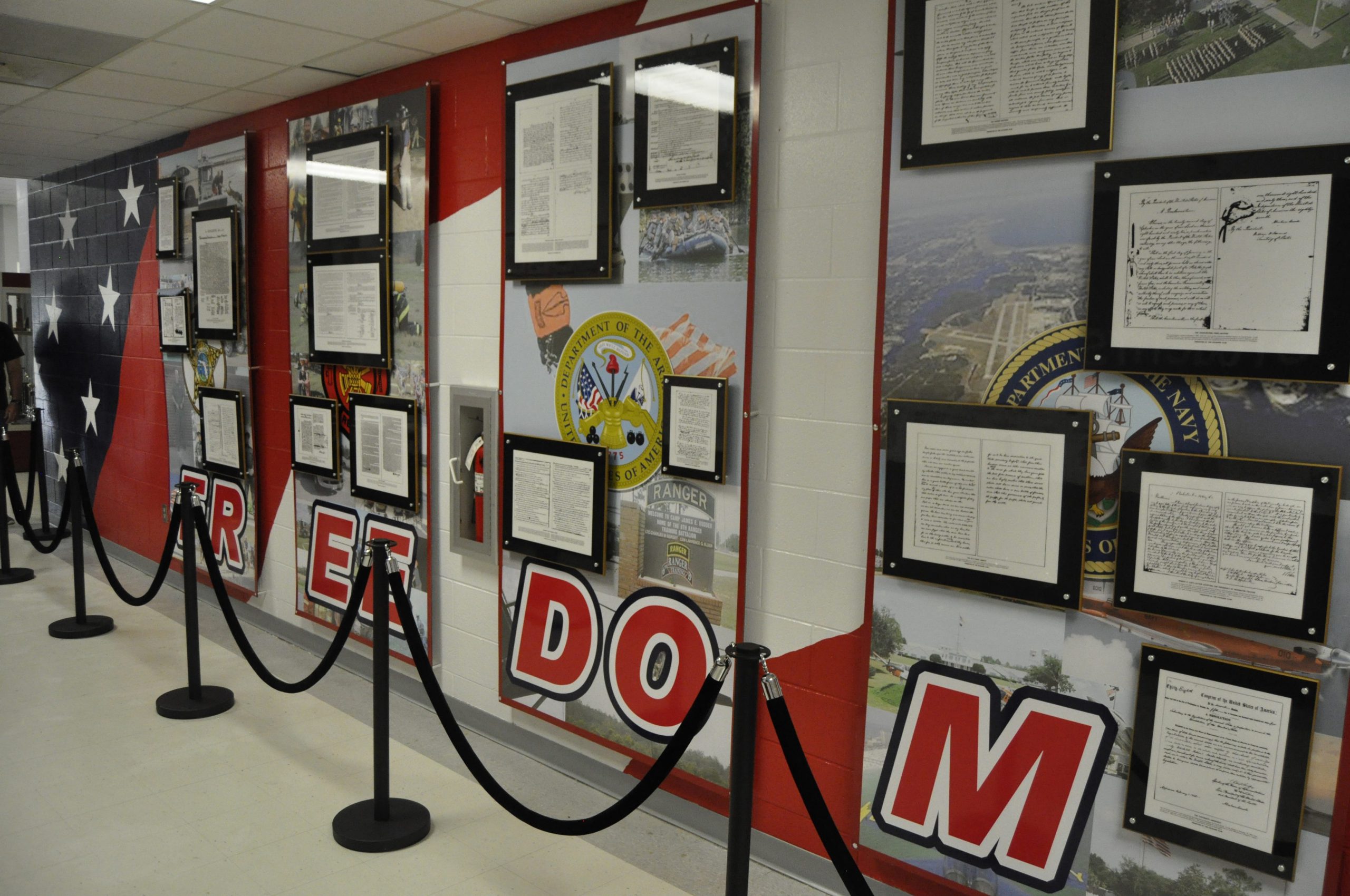 The new freedom shrine at Baker School includes displays from all five branches of the military, along with law enforcement and firefighter/EMT displays. [AARON JACOBS|NEWS BULLETIN]