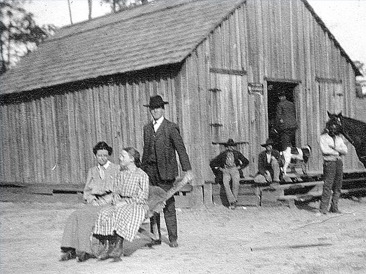 An early 20th-century North Okaloosa family jokes around with a wheelbarrow. Their descendants can learn more about them and other ancestors during a family history workshop Friday at Baker Block Museum's library.