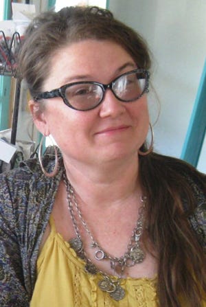 Kristal Petruzzi is pictured May 17 in her studio in Crestview.