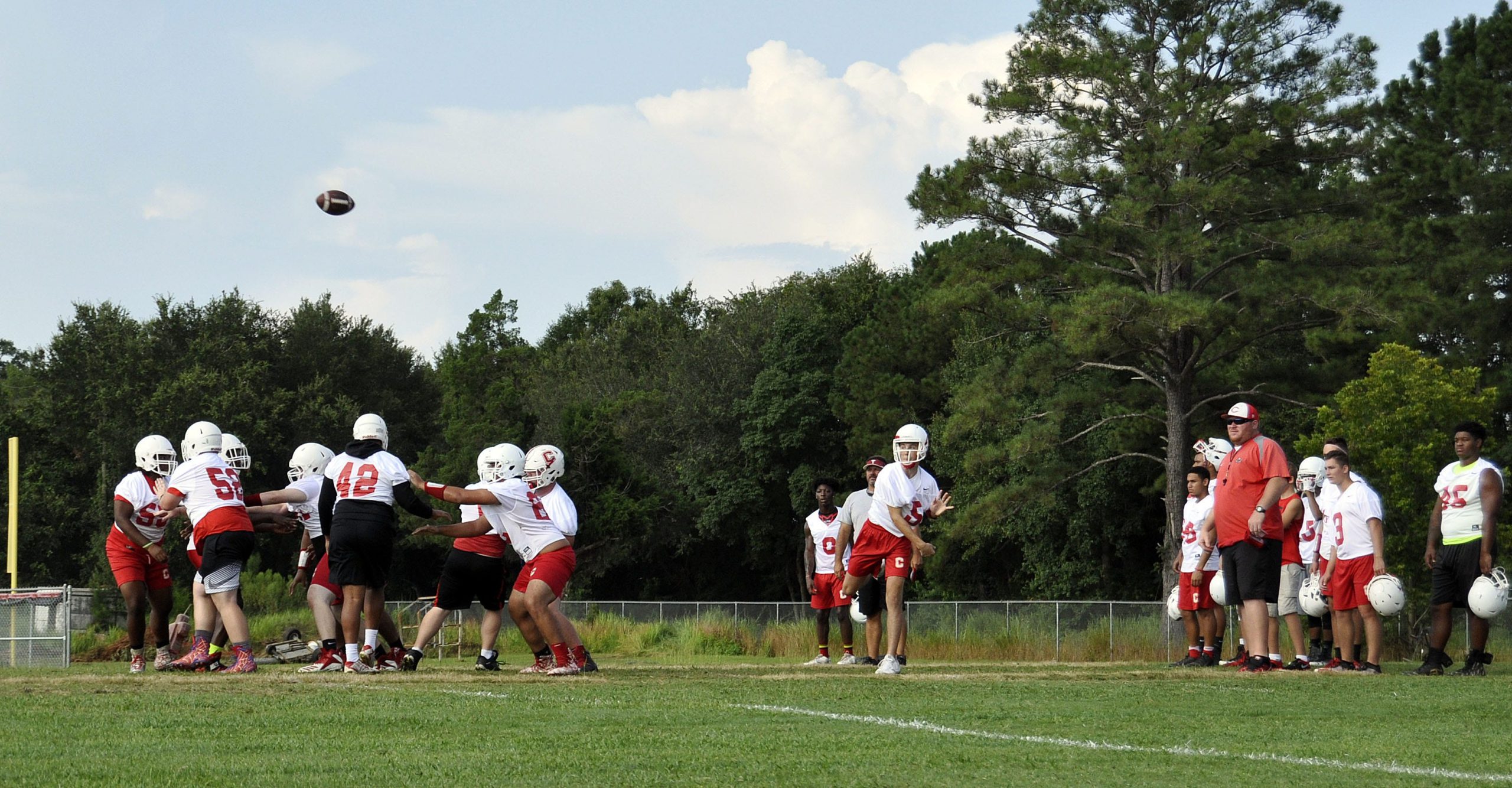 The Crestview Bulldogs practiced plays during their first week back on the field before the season begins on August 24.

[KAYLIN PARKER/NEWS BULLETIN]