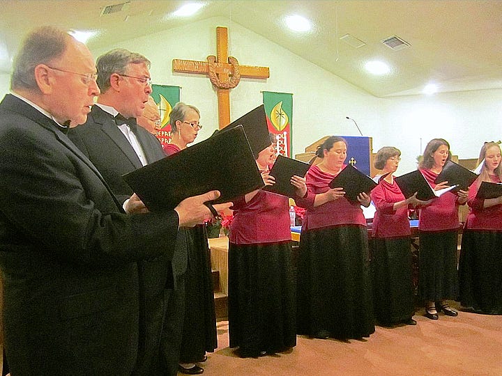 Schola Cantorum ( Latin for “school of singing”) members — pictured during a 2012 Christmas concert in Crestview — will present their 14-number concert, "A Babe is Born," on Dec. 16.