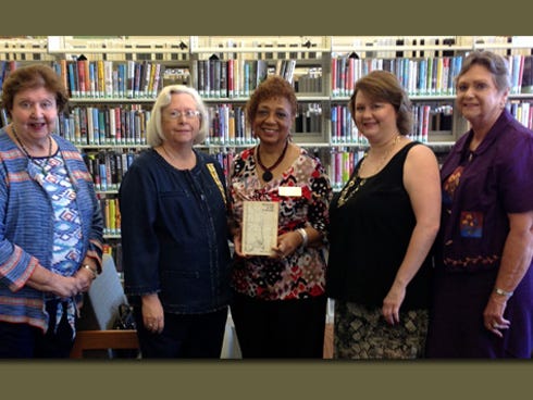 Special to the News Bulletin

The Daughters of the American Colonists' Eucheeanna Chapter recently donated "Pioneering in the Panhandle," a regional history by William James Wells, to the Crestview Public Library. Pictured, from left, are Betty Patterson, Margaret Nichols, library director Jean Lewis, Cynthia Brock and Sharon Wilkerson.