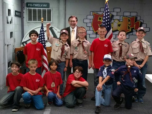 Cub Scouts pictured with Crestview Mayor David Cadle, top row from left, are Evan Destin, Noah Gibson, Wyatt Corbin, Brydan Meinecke, Joshua Alton and Ryan Rummelt. Bottom row: Troy Young, Drew Biro, Anthony Leggio, Anthony Trapaso, Matthew Gibson and Ethan Schulte.