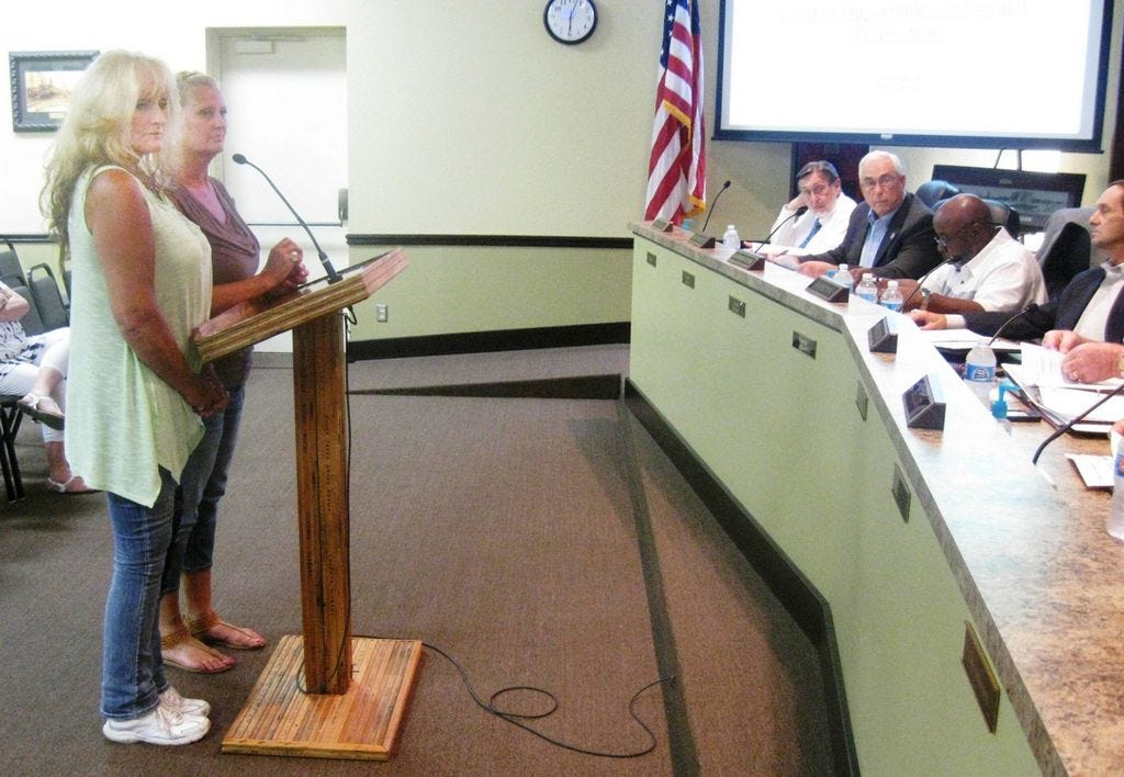 Panhandle Animal Welfare Society Director Dee Thompson and supervisor of animal control Mary Rutter respond to the Crestview City Council's questions.