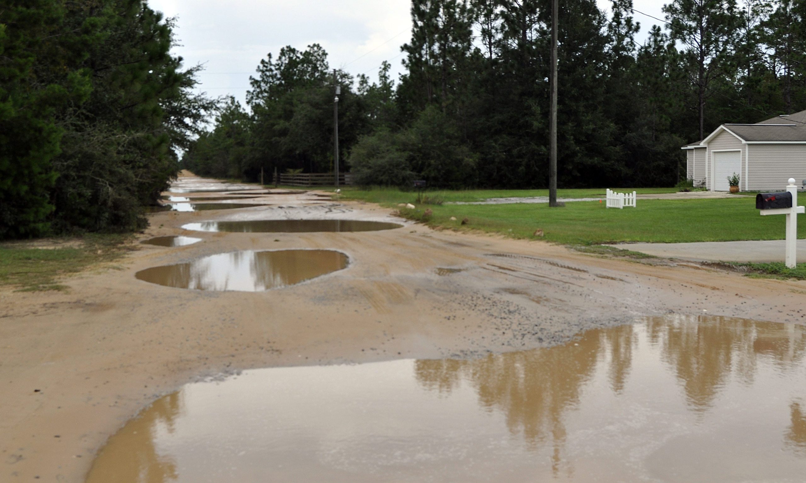Residents are pleading for something to be done about the holes in the middle of Colt Drive, a dirt road in Crestview.

[KAYLIN PARKER/NEWS BULLETIN]
