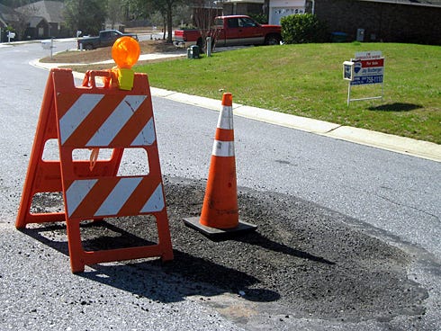 This repair in the middle of Territory Lane in Crestview belies a 350-foot disaster lurking 13 feet below the surface.