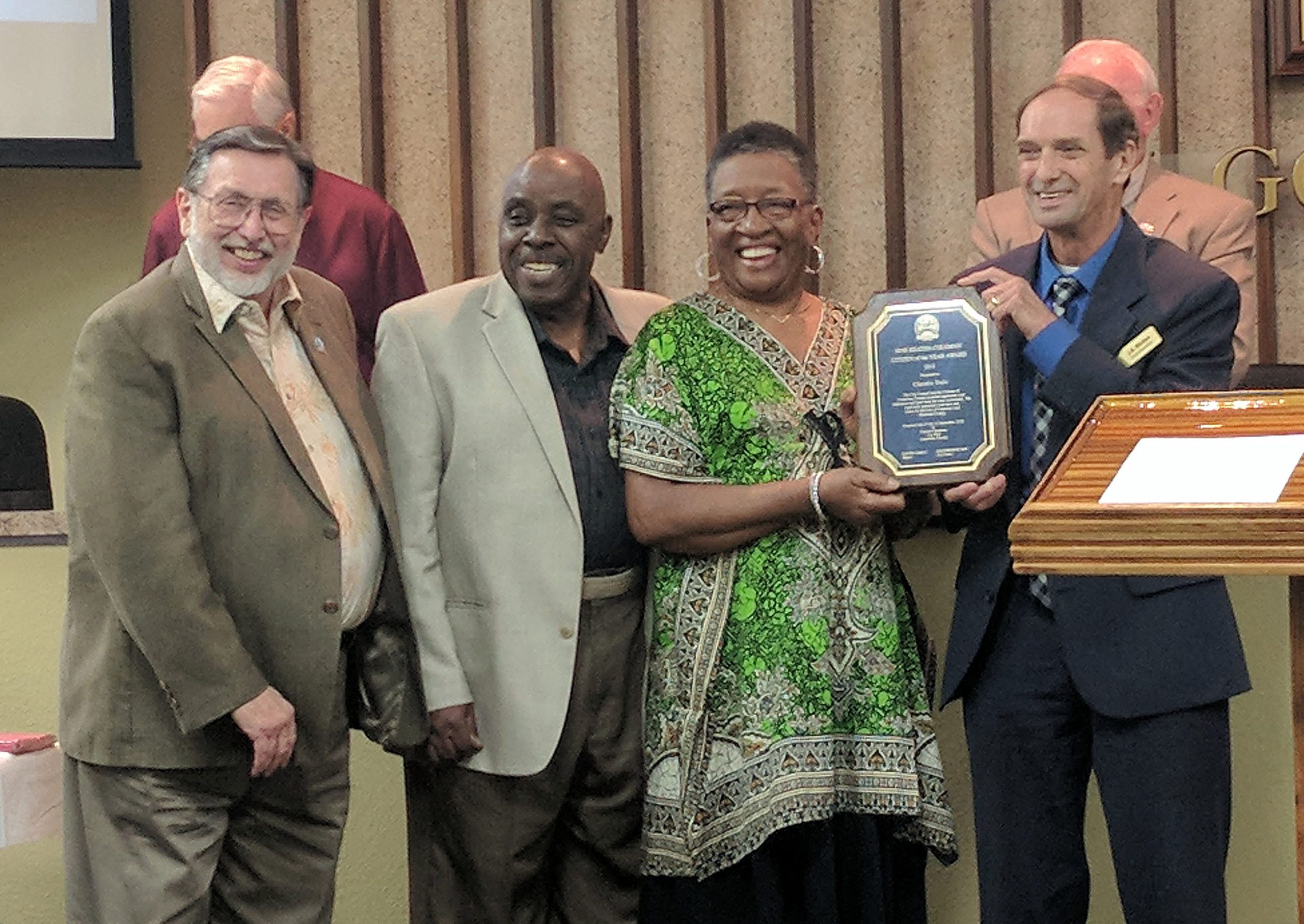 Claudis Dale stands with Mayor David Cadle, Councilman Shannon Hayes, and Council President J.B. Whitten. Dale received the Mae Reatha Coleman Citizen of the Year award.

[KAYLIN PARKER/NEWS BULLETIN]