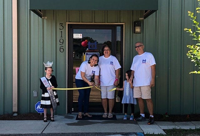 The King family held their ribbon cutting ceremony for the grand opening of Jumpin Beans Playzone Sep. 8. The new playzone offers a variety of fun options for children up to 12 years old. [MONNIE VILLANEA/CONTRIBUTED PHOTO]