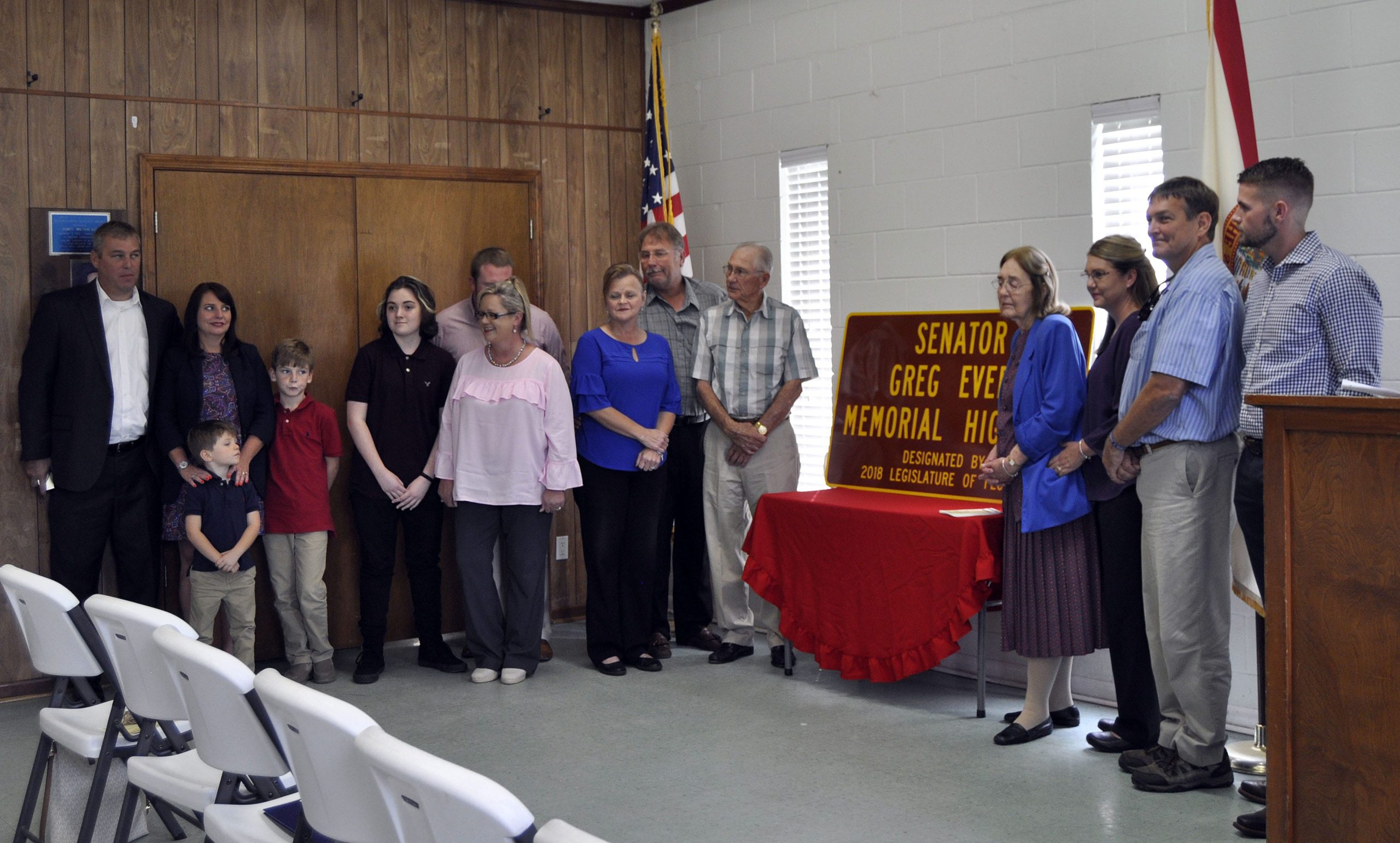 The family of Senator Greg Evers revealed the road designation sign that will be placed at both ends of SR 4 between Munson Highway and State Road 189 in Santa Rosa and Okaloosa counties to name that portion ìSenator Greg Evers Memorial Highway.î

[KAYLIN PARKER/NEWS BULLETIN]