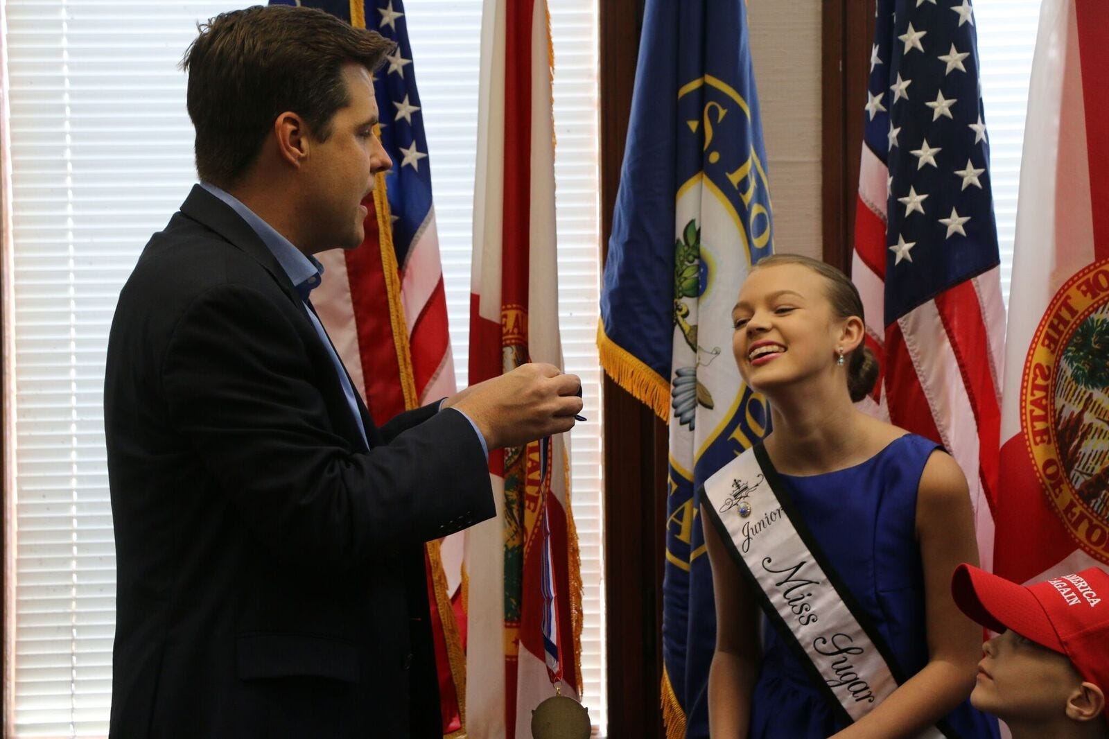 Congressman Matt Gaetz awarded Kadance Frederickson with a Presidential Volunteer Service Award for her volunteer services including food drives for the Crestview Homeless Shelter and delivering 200 teddy bears she collected to the Children’s Coalition of Florida. [CONGRESSMAN MATT GAETZ OFFICE/CONTRIBUTED PHOTO]