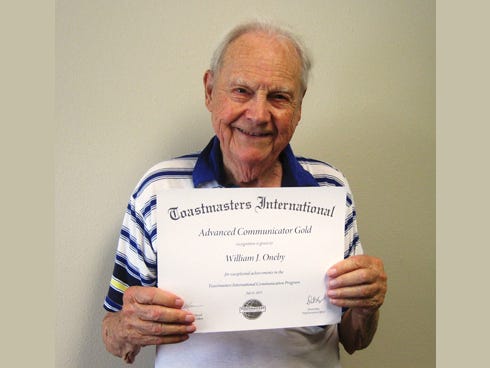 Crestview resident William Oneby, 92, displays the Toastmasters International certificate he received by completing 40 addresses plus an hour-and-a-half speech.