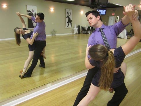 Hannah Teal Kania and Aaron Stowell get in some rehearsing time at the Crestview Fred Astaire Dance Studio.