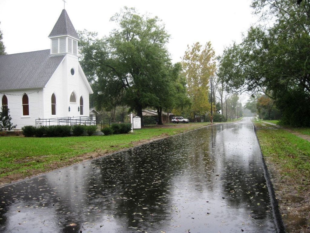 Newly repaved Fourth Street — pictured in front of Laurel Hill Presbyterian Church — is among several Laurel Hill streets to be resurfaced in the city's first comprehensive paving program since the 1960s.