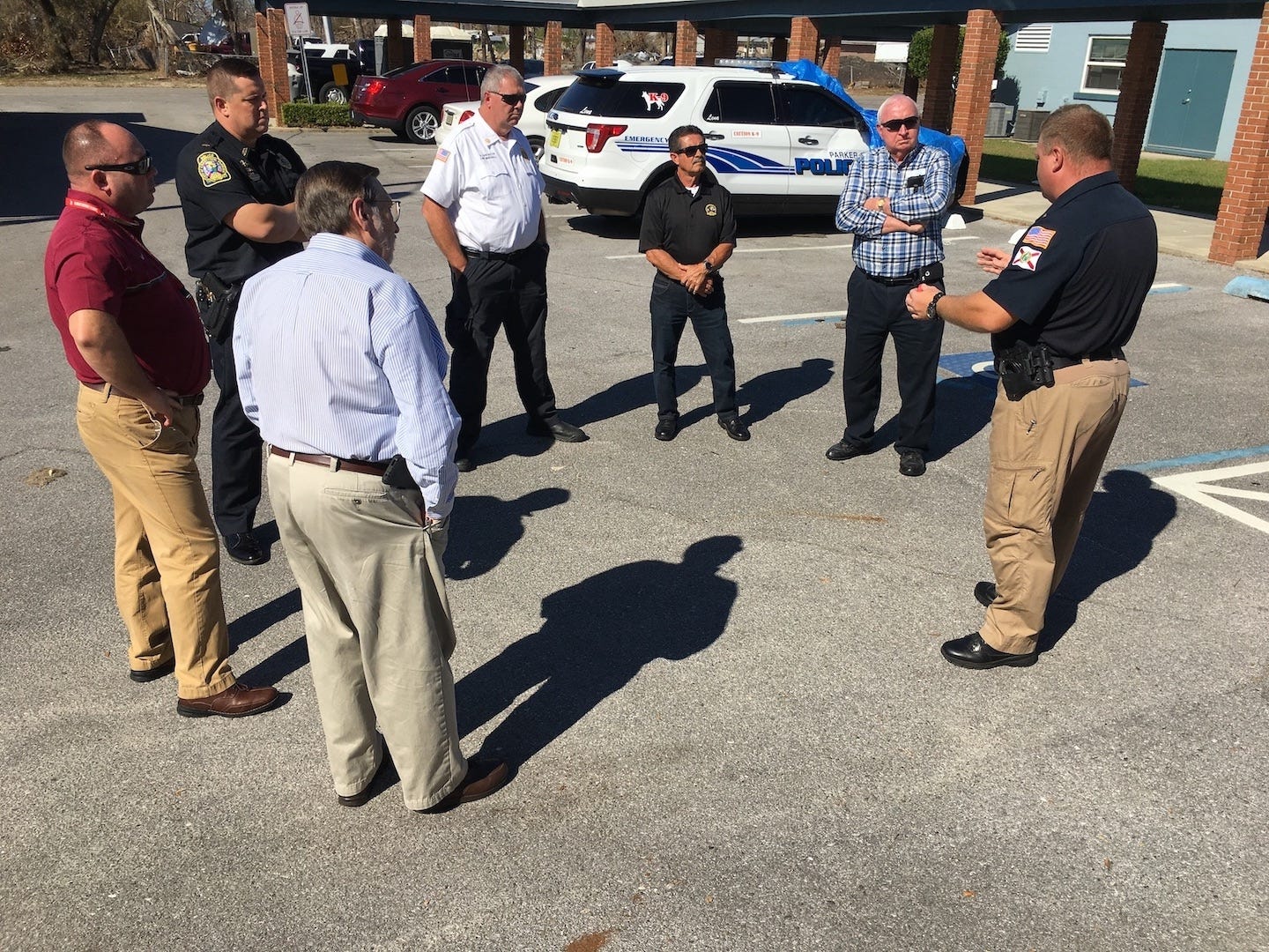 Crestview officials meet with Parker Police Chief Dennes Hutto, right, to learn how the town’s public safety officials addressed Hurricane Michael’s aftermath. Clockwise from lower left are Mayor David Cadle, Deputy Police Chief Jamie Grant, Police Commander Andrew Schneider, Fire Marshal Rodney Lancaster, and City Council members Bill Cox and Joe Blocker. [BRIAN HUGHES/SPECIAL TO THE NEWS BULLETIN]