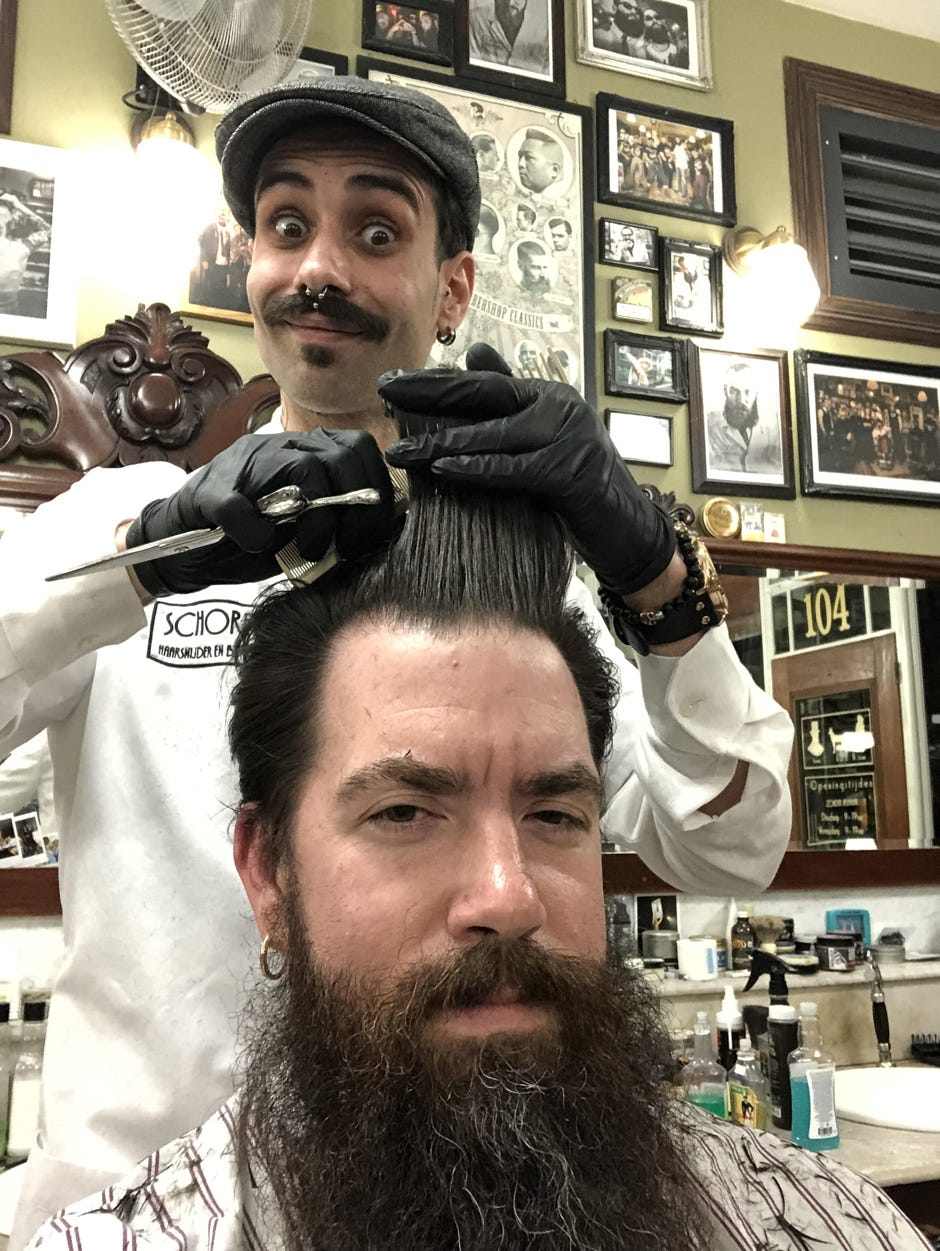 One of the highlights of Quentin Paulsen's (bottom) trip to the Schorem barber shop in Rotterdam, was getting his hair and beard groomed with precision by barber Kani. The shop, owned by Reuzel products creators Leen and Bertus, is a men-only shop that provides classic cuts and old school grooming. [CONTRIBUTED PHOTO | SPECIAL TO THE NEWS BULLETIN]