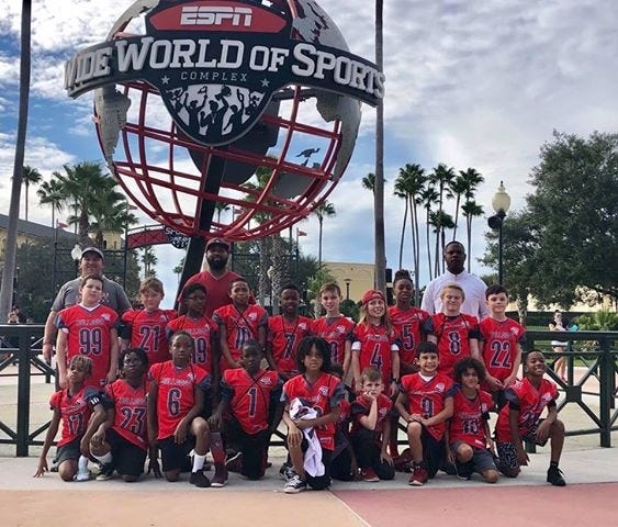 The Mitey Mite football team competed at the ESPN World of Sports. The team played in a Pop Warner invitational tournament. [CONTRIBUTED PHOTO]