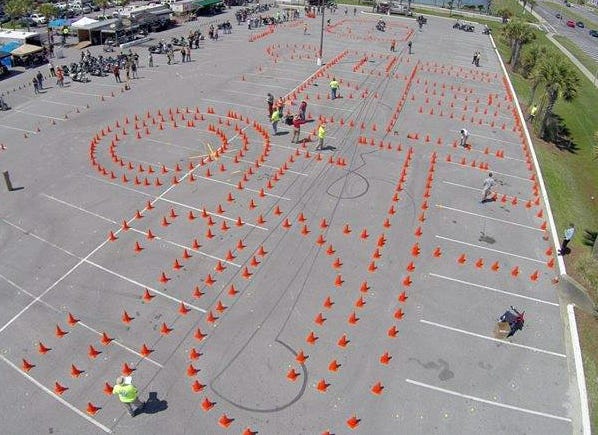 The rodeo features challenges that test motorcyclists' skills.