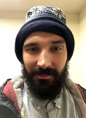 Elvis Mujic, a comedian who has traveled across the U.S., told jokes for the clients Jan. 2 at Crestview Area Shelter for the Homeless. [CONTRIBUTED PHOTO]