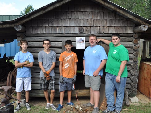 Five members of Crestview Boy Scout Troop 773 cleaned and reorganized Wilkinson’s Blacksmith Shop on Sunday at Baker Block Museum. Some troop members were working toward their James Stewart Good Citizenship Award; others were gathering community service hours. Pictured, from left, are Hunter Morrison, Austin Carrico, Ethan Ball, Jerry Hand and Brandon Woods.