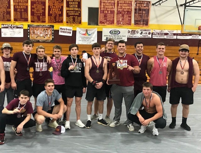Baker's weightlifting team won the district title on Friday. [CONTRIBUTED PHOTO]