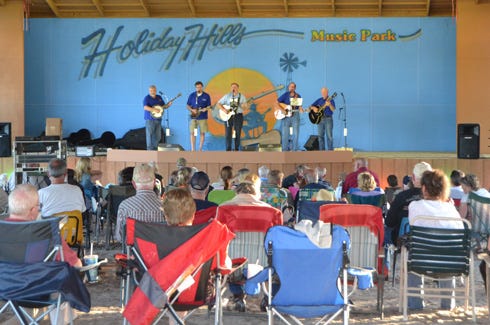 Attendees enjoy a previous Holiday Hills bluegrass festival performance.