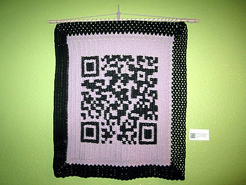 Lincoln Sayger's "Quixotic Reference" is an interactive textile work crocheted in acrylic yarn.