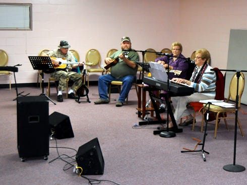 Tom Sutton, Ricky Hart, Margie Roberts and Lois Lancester perform gospel and country music on Friday at Old Spanish Trail Park's Senior Activity Center.