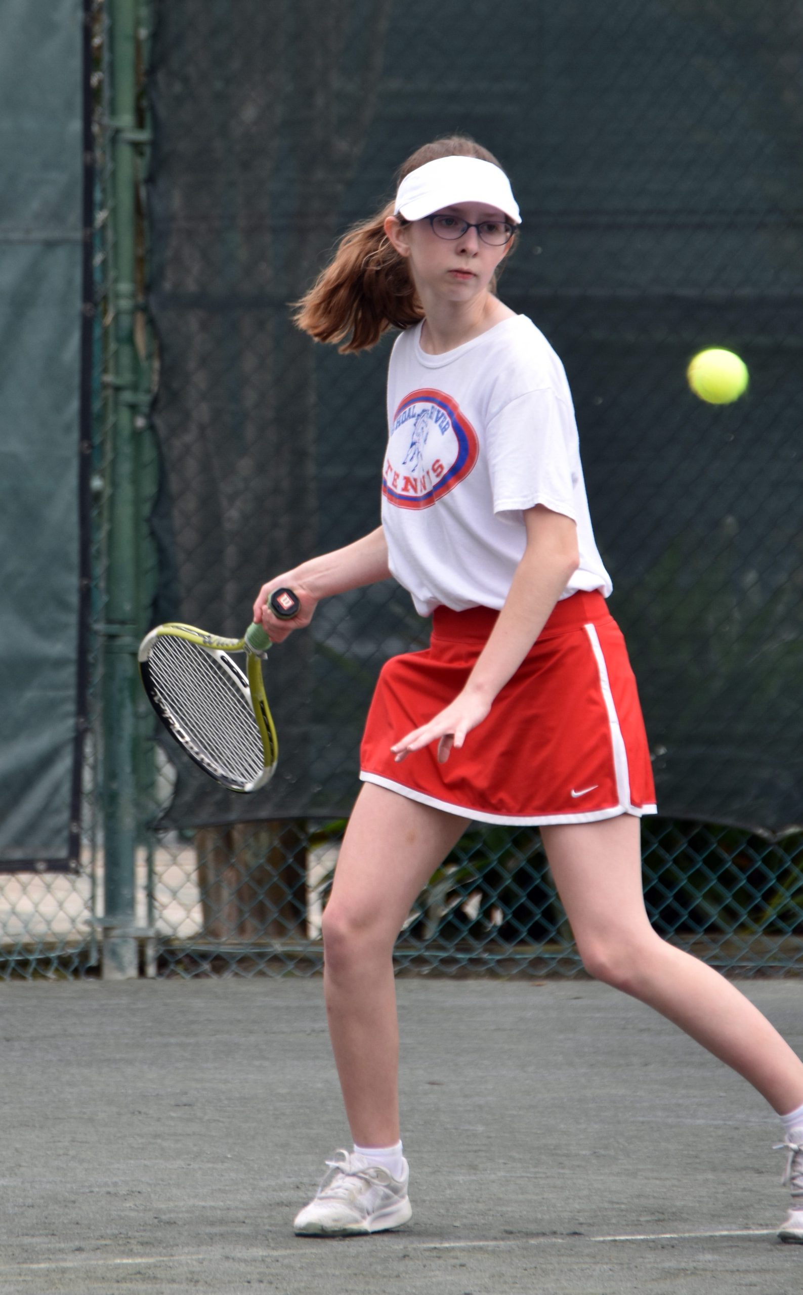 Shoal River's Tiffany Rowe makes a move on the ball during a singles match in the Okaloosa County Middle School Tennis Tournament at Bluewater Bay. Rowe won the match 6-2. [TINA HARBUCK/THE LOG]