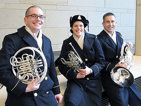 Crestview High School alumnus Ben Cadle, right, and fellow Army Ceremonial Band members wait in the Capitol Visitors Center for the 2009 Inaugural Parade to begin.