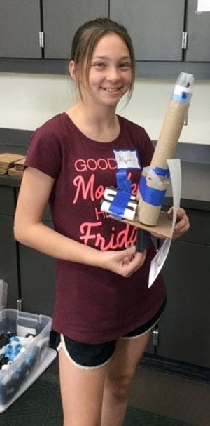 Baker resident Alyee Mathews, 11, displays the spaceship she created during Ages 9-14 Library June 25 at the Crestview library. Two more projects remain this summer. If youíd like to silk dye your own galaxy or become a planet while making a tasty treat, come visit the library at 3 p.m. July 9 and 16, 1445 Commerce Drive, Crestview. [CONTRIBUTED PHOTO]