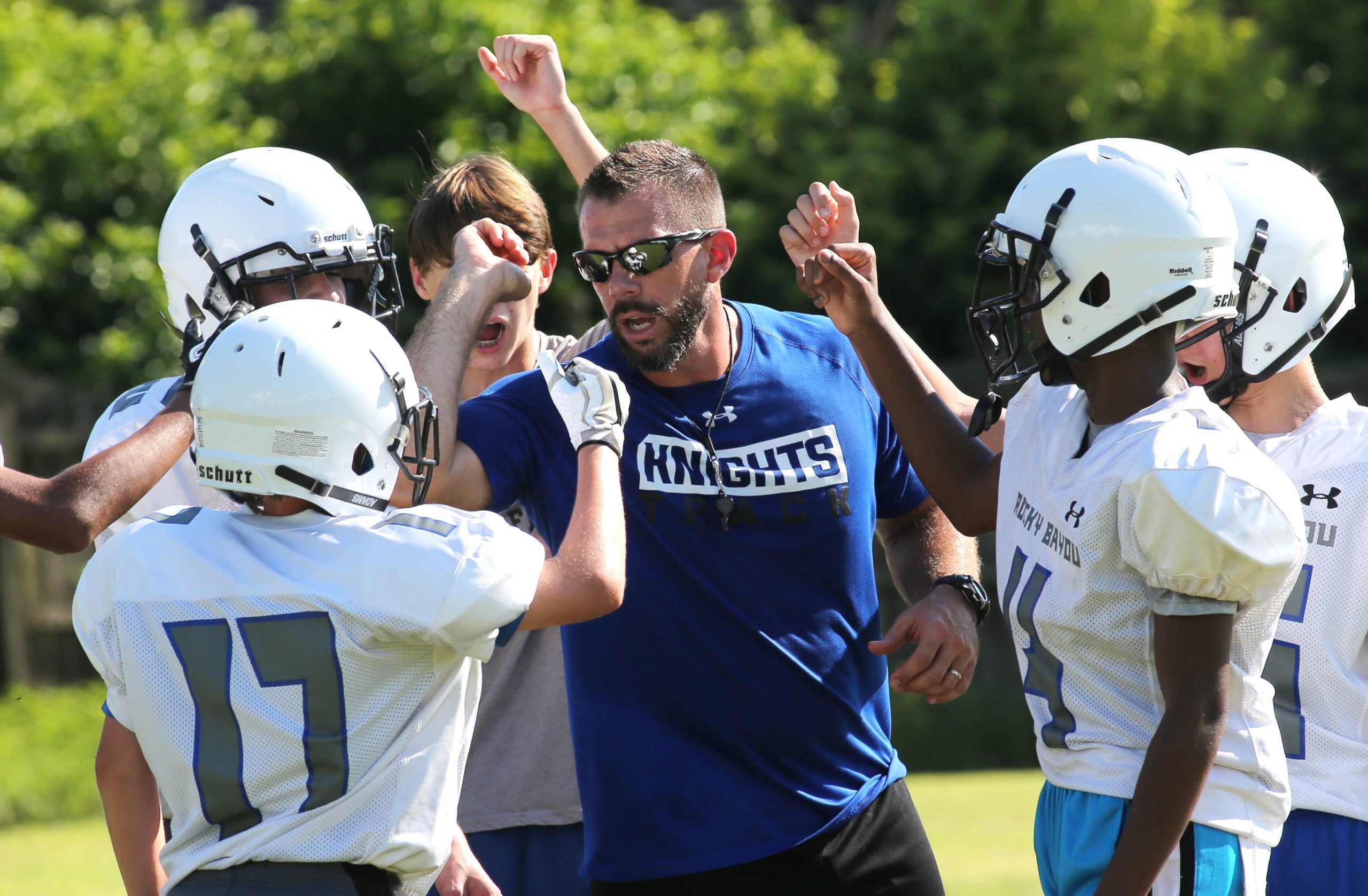Rocky Bayou coach Josh Childers rallies his players in a preseason practice at the school. [MICHAEL SNYDER/DAILY NEWS]