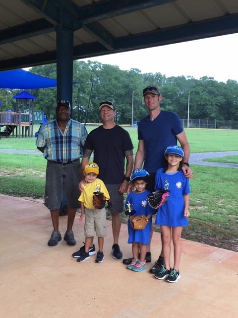 Johnny James (left) showed apprection for the help of Franky Gonzales (middle) and Levi Baril (right) during a special presentation. [CONTRIBUTED PHOTO]