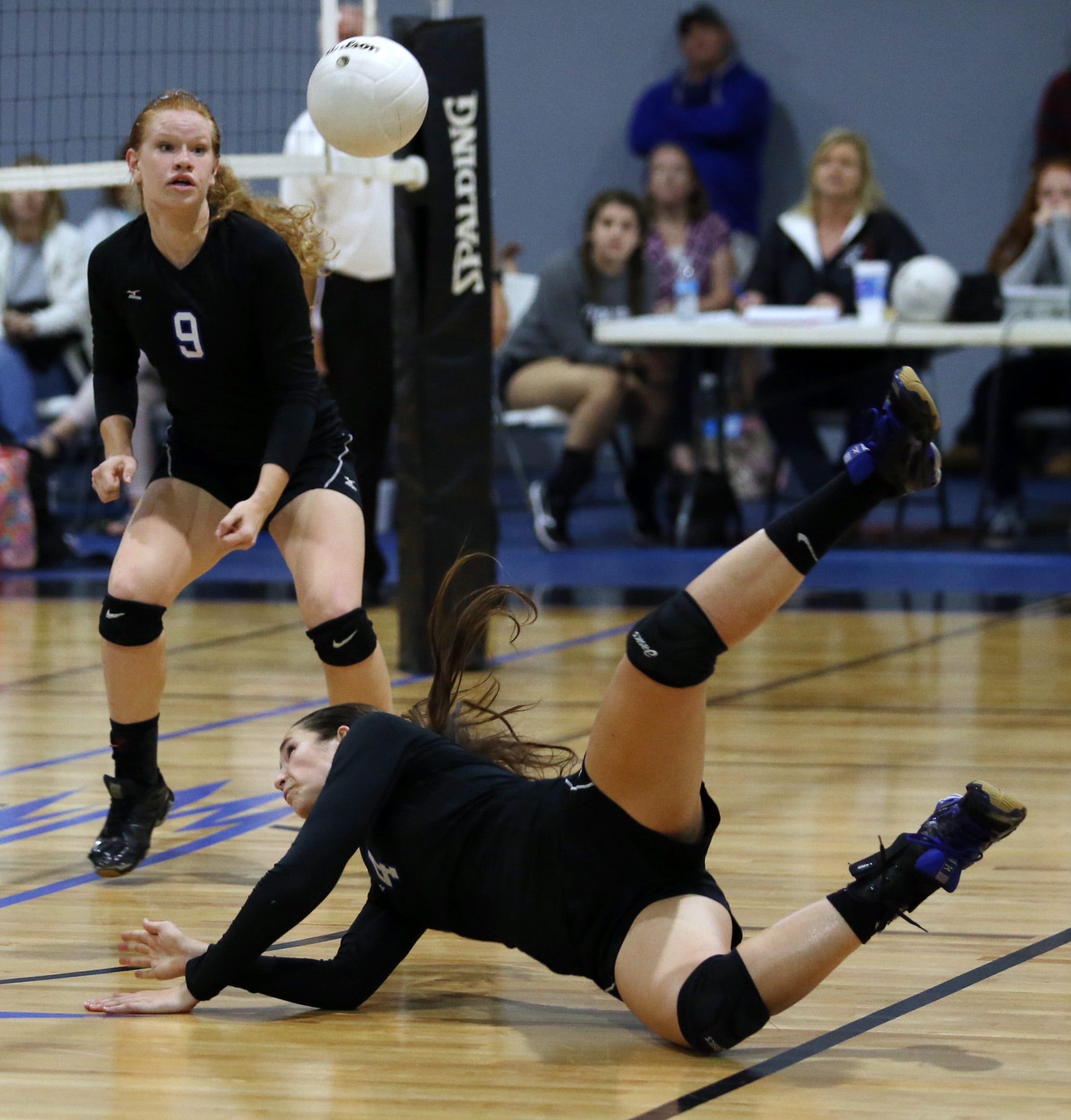 Rominey Wilner makes a diving save as Rocky Bayou played Florala in volleyball. [FILE PHOTO]