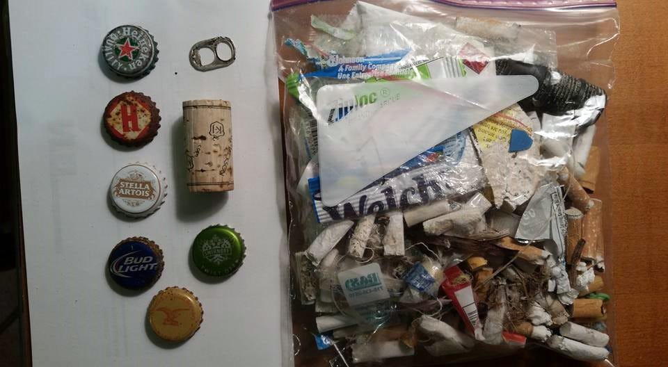 This collection of beach finds — including plastics, bottle caps and Maia McGuire's other found items — represents the kinds of items polluting Northwest Florida waterways, harming fish and wildlife.
