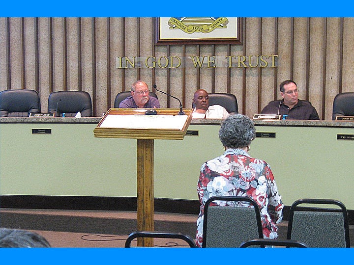 During Monday evening's budget workshop, City Clerk Betsy Roy, back to camera, faces three remaining councilmen, Mickey Rytman, President Shannon Hayes and Tom Gordon, after Councilwoman Robyn Helt left the chamber in frustration.