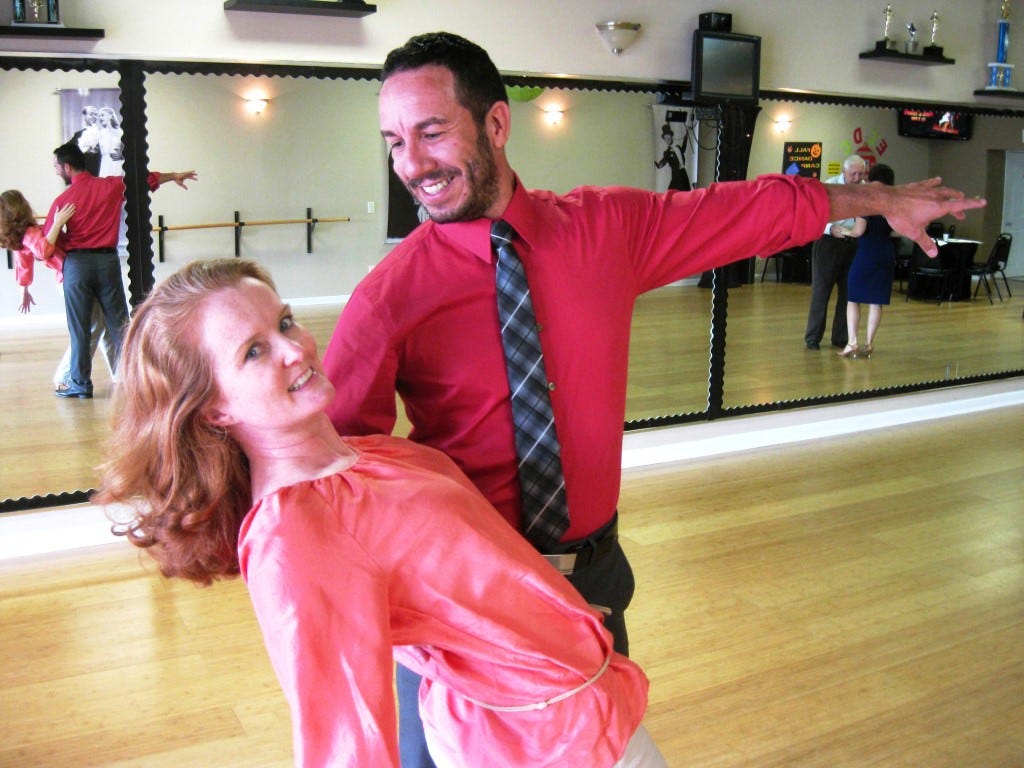 Dr. Wanda Batson — a local celebrity dancer for Covenant Hospice's Oct. 4 Blue Jean Ball — practices her dance routine with Fred Astaire Dance Studio owner and instructor David Colón.