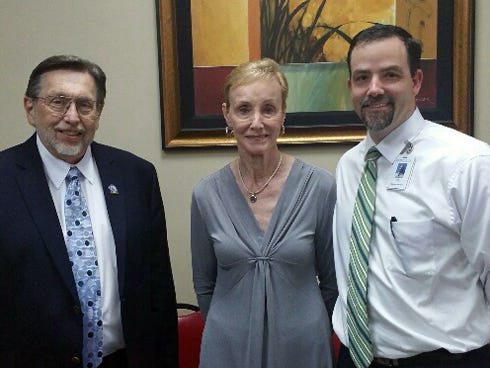 North Okaloosa Medical Center CEO Ronnie Daves and NOMC board of trustees Chairman Pam Meadows are pictured with Crestview Mayor David Cadle, left, at the hospital's Dec. 1 smoke-free celebration.