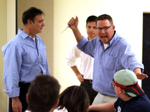 Tensions flare between Joseph Perna, Joseph Kenkel and Silas Ford, who play jurors in View From the Stage’s production of “Twelve Angry Men,” opening next weekend.