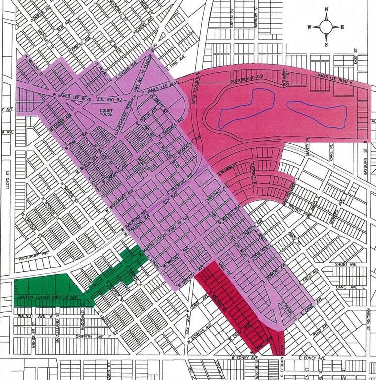 The central purple area is the original 1995 Crestview Community Redevelopment Agency district. It was expanded to include the three smaller areas in 1998.