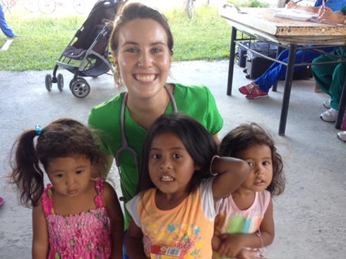 Fallon Simmons — pictured during a recent mission with Belizean children — helped 16 North Okaloosa volunteers provide health care to people in seven impoverished villages. “After getting (to) see the poverty these people lived in, all I wanted to do was help them out even more," the registered nurse said.