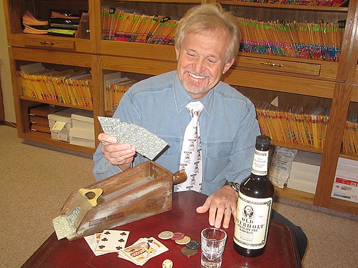 Dr. Richard Thomas displays 19th-century Wild West artifacts to be placed in his permanent exhibit dedicated to Doc Holliday.