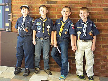 From left, Cub Scouts Isaac Boyd, Wyatt Corbin, Brydan Meinecke and Dylan Nearbin were among 11 Boy Scouts who participated in Scout Sunday events at area churches. The boys attend St. Mark's United Methodist Church in Crestview.