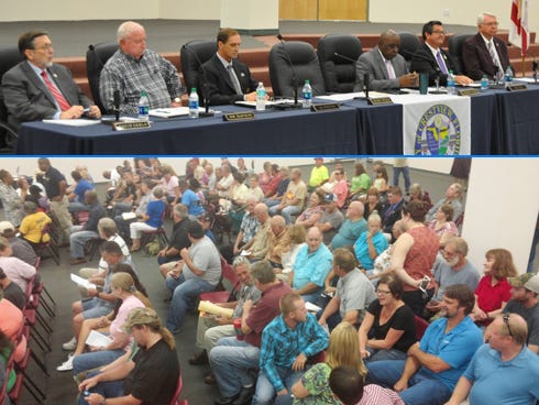 More than 60 people shared their thoughts about the Confederate battle flag fluttering above Confederate Park on East First Avenue during a public hearing on Thursday at Warriors Hall.