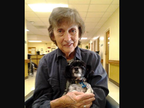 Cindi Chapman brings her Pomeranian and Terrier, Levi, to Silvercrest Manor Nursing and Rehabilitation Center in Crestview each month to visit with residents. Here, Levi visits with Silvercrest resident Annette Mernik.
