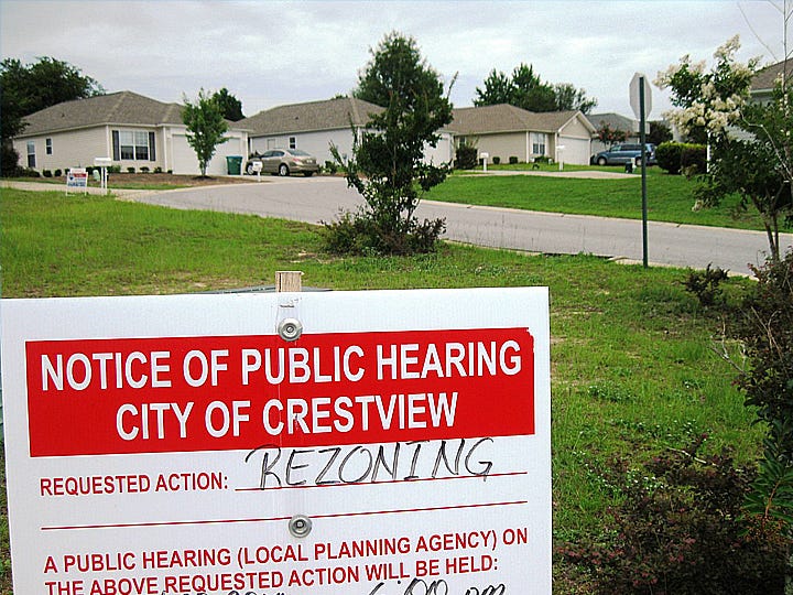 If any of these homes in this neighborhood off P.J. Adams Parkway were damaged or destroyed, a zoning conflict corrected at Monday’s City Council meeting would have precluded them from being rebuilt.