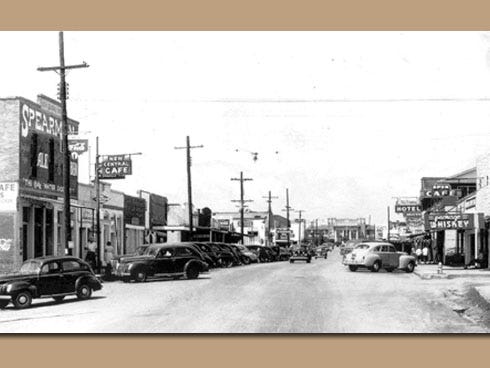 Main Street in Crestview, as seen in the 1940s, was crowned, then as it is today, by the county courthouse. The town's railroad depot stood next to the New Central Café, left, just out of the picture.
