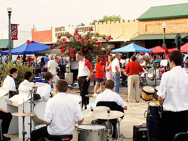 Street festivals, such as this Music and Art on Main Street summer festival, are among cultural activities the chamber of commerce Arts and Culture Committee seeks to support.