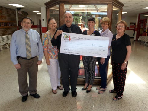 Pictured from left: Crestview Mayor David Cadle; Martha and Tom Hughes, Sons of Italy Richard A. Capozzola Lodge 2865; Rachel Mayew, Covenant Hospice development manager; Joy Browne; and Karen Boisjolie.