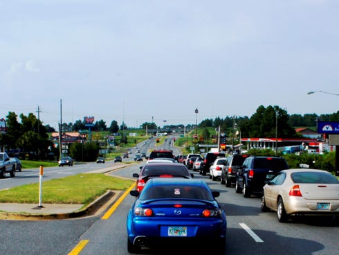 Northbound rush-hour traffic along State Road 85 south of Interstate 10 stacks up at John King Road. Traffic impact fee waivers might have facilitated business growth during the recession, as intended, but it dried up city road funds.
